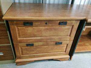 lot 8 image: 3 DRAWER DESK WITH TWO SLIDE OUT TRAYS ALSO INCLUDES 2 DRAWER LATERAL FILING CABINET (LATERAL CABINET NEEDS NEW SHELF BOTTOMS) BOTH ARE IN GREAT CONDITION OTHERWISE