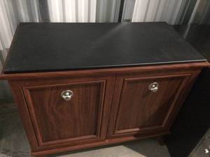 lot 5 image: BLACK LAMINATE TOP MAHOGANY COLORED 2 DOOR CABINET WITH  ORGANIZERS INSIDE - MATCHES LOT 3 & 4