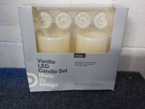 lot 66 image: Vanilla LED Candle Set...