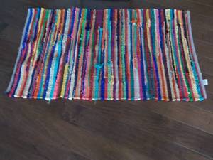 lot 42 image: Area Rug 29 x 49 in a Covered Tub...