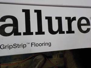 lot 148 image: 8 cases Allure Grip strip Flooring ...