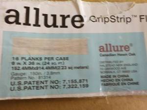 lot 157 image: 12 Cases Allure Grip Strip Flooring...