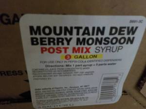 lot 262 image: 2 - 3 Gallon Mountain Dew Berry Mon...