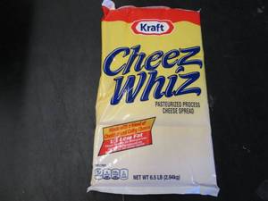 lot 341 image: 6.5 lb bag Kraft Cheez Whiz needs no refrigeration till opened.  Dated 4-1 2021
