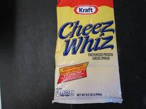 lot 342 image: 6.5 lb bag Kraft Cheez Whiz needs no refrigeration till opened.  Dated 4-1 2021