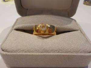 18 kt HGE ring...