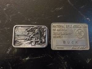 2 belt buckles...
