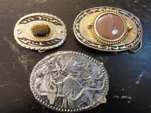 3 belt buckles...