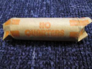 Roll of qiarters, top one is 1966...