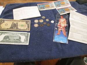 Foreign coins and assorted noveltie...