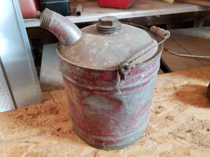 lot 22 image: Vintage Metal Gas Can and Funnel