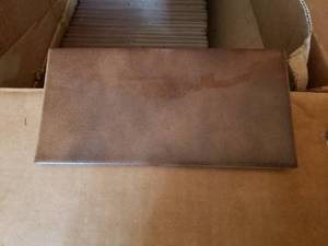 lot 23 image: 94 Pieces of Brown Tile