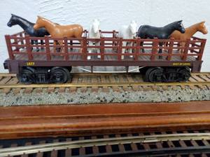 lot 143 image: Lionel No.1877 Flat Car with Horses
