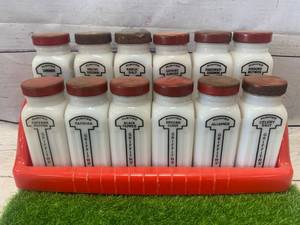 lot 92 image: Vintage Milk Glass 1950s Griffiths Lot of 12 Spice Jars