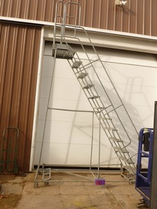 10 Cotterman rolling ladder. Used condition. Has minor dings & scrapes but is a working unit. As shown. THIS ITEM HAS A RESERVE.
