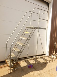 6 Cotterman rolling ladder. Used condition. Has minor dings & scrapes but is a working unit. As shown. THIS ITEM HAS A RESERVE.