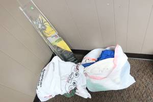 lot 36 image: Spider-Web Fishing Rod & Bags of ShirtsRags