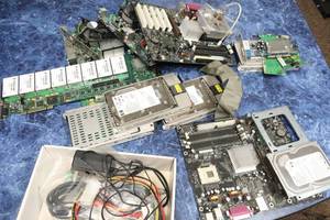lot 55 image: Pile pf Computer Parts & Hard Drives