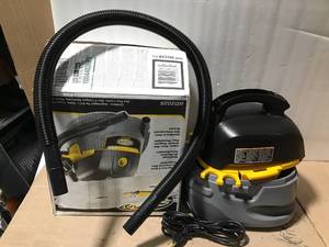 lot 2 image: 2.5 Gal. 1.75-Peak HP Compact WetDry Shop Vacuum with Filter Bag, Hose and Accessories by StingerBag, Hose and Accessories by Stinger in good condition