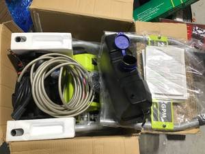 lot 18 image: 2,000 PSI 1.2 GPM Electric Pressure Washer by RYOBI in good condition