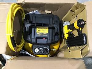 lot 30 image: 6 Gal. 18-Gauge Brad Nailer and Heavy-Duty Pancake Electric Air Compressor Combo Kit (1-Tool) by DEWALT in good condition