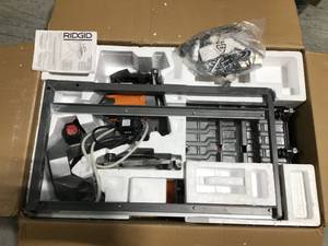lot 50 image: 9 Amp Corded 7 in. Wet Tile Saw with Stand by RIDGID  USED