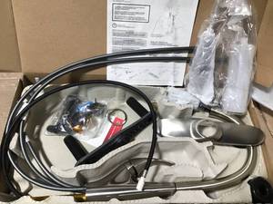 lot 78 image: DeLuca Single-Handle Pull-Down Sprayer Kitchen Faucet with ShieldSpray Technology and Soap Dispenser in Stainless in good condition