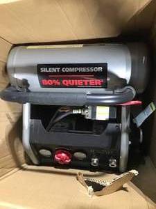 lot 84 image: 4.5 Gal. Portable Electric-Powered Silent Air Compressor by Husky in good condition