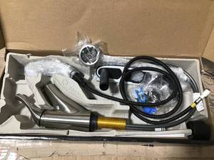 lot 99 image: Grant Single-Handle Pull-Out Sprayer Kitchen Faucet In Stainless by Delta in good condition