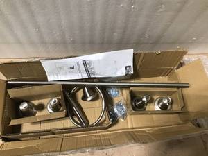 lot 100 image: Porter 3-Piece Bath Hardware Set with Towel Ring, Toilet Paper Holder and 24 Towel Bar in SpotShield Brushed Nickel by Delta in good condition