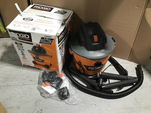 9 Gal. 4.25-Peak HP NXT WetDry Shop Vacuum with Filter, Hose and Accessories by RIDGID in good condition