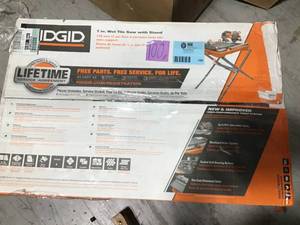 9 Amp Corded 7 in. Wet Tile Saw with Stand by RIDGID in good condition