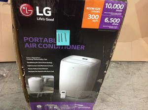 10,000 BTU (6,500 BTU, DOE) 115-Volt Portable Air Conditioner with Dehumidifier Function and LCD Remote in White by LG Electronics IN GOOD CONDITIONS