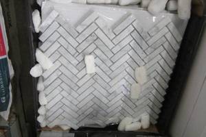lot 43 image: Jet Stream White Herringbone 10 in. x 11 in. x 8 mm Honed Marble Stone Mosaic WallFloor Tile by Jeffrey Court (7.63 Sq Ft)