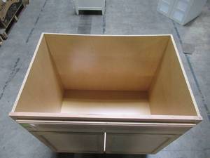 lot 204 image: Hampton Bay Assembled 36x34.5x24 in. Sink Base Kitchen Cabinet in Unfinished Beech KSB36-UFDF