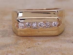 lot 25 image: 14 Carat Channel Set Diamond Estate Ring in 14k Yellow Gold $1999 Retail