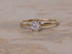 lot 28 image: Lovely and Classic .33 Carat Diamond Solitaire Estate Ring in 14k Yellow Gold $2000 Retail