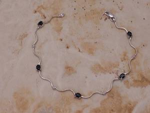 lot 45 image: Elegant Natural Sapphire and Diamond Bracelet in White Gold