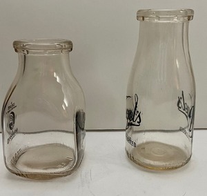 lot 44 image: Pair of Vintage Glass Milk Jars- Voegels & Marigold Rich Dairy