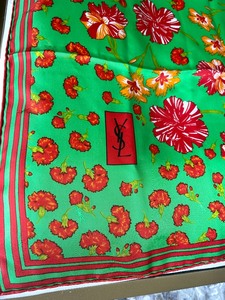 lot 84 image: Vintage Yves St. Laurant (YSL) 100% Silk Scarf