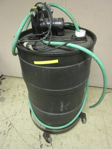 lot 130 image: UTILITY BARREL ON CART, WITH 12 HP PORTABLE UTILITY PUMP, HOSES