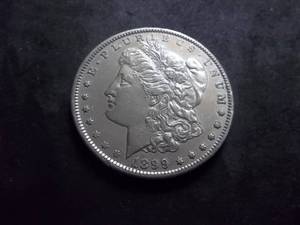 lot 28 image: 1899 O Morgan Silver Dollar