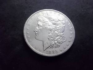 lot 11 image: 1885 O Morgan Silver Dollar