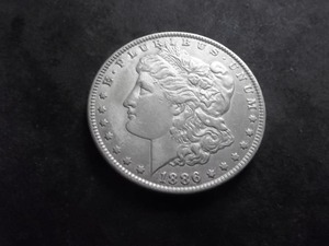 lot 13 image: 1886 Morgan Silver Dollar