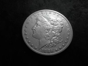 lot 14 image: 1886 O Morgan Silver Dollar