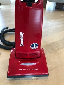lot 51 image: Red Simplicity Symmetry Vacuum w 16 hose