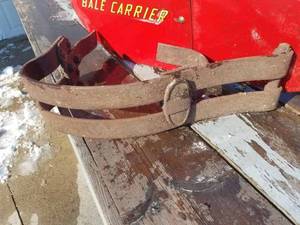 One Half of a Split Bumper for Model A Ford and a New Holland Bale Carrier Cover