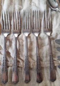 24 Pieces of Ornate Silverware