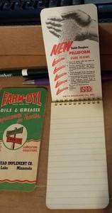 1946-47 Farm-Oyl Memo Book from Moorhead Implement Co. and a 1956 SD Fertilizer Memo Book