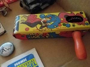 Box of Collectibles 2 Metal Badges, USA Tin Noise Maker, Old Nail Puzzle from Eternal Metal Flues